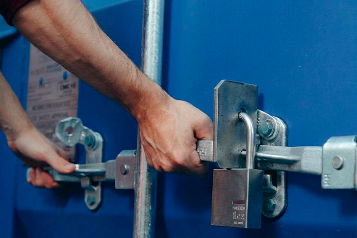 a hand holding a lock